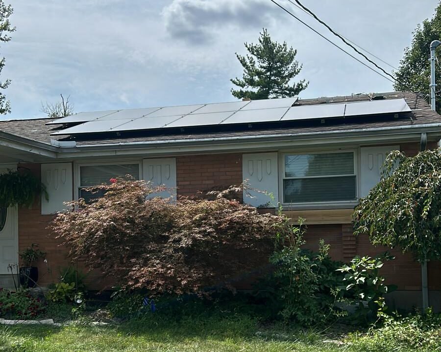 Rooftop solar panels installed by local technicians